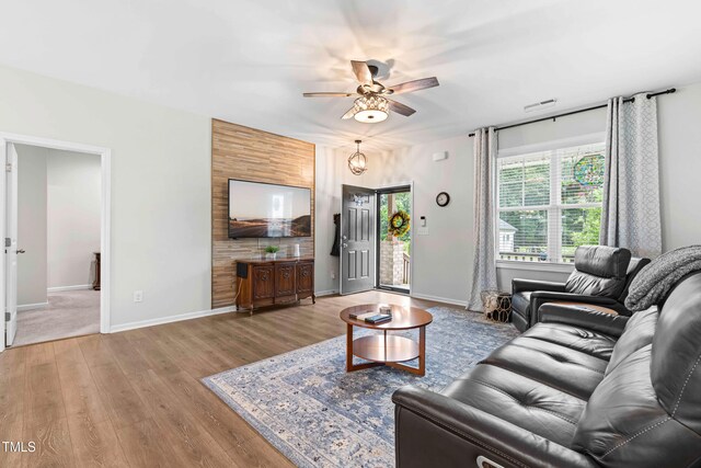 173 Longbow Dr, Middlesex, NC 27557 - living area featuring ceiling fan, wood finished floors, and baseboards