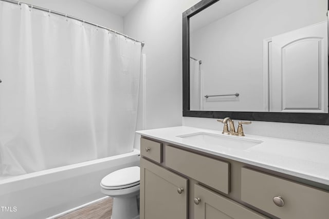 173 Longbow Dr, Middlesex, NC 27557 - bathroom with vanity, toilet, shower / bath combo, and wood finished floors