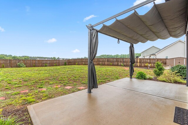 173 Longbow Dr, Middlesex, NC 27557 - view of patio with a shed