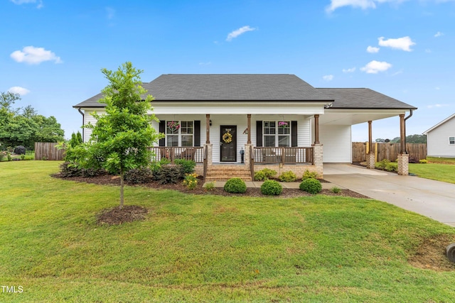173 Longbow Dr, Middlesex, NC 27557 - view of front of house featuring driveway, a porch, an attached carport, and a shingled roof