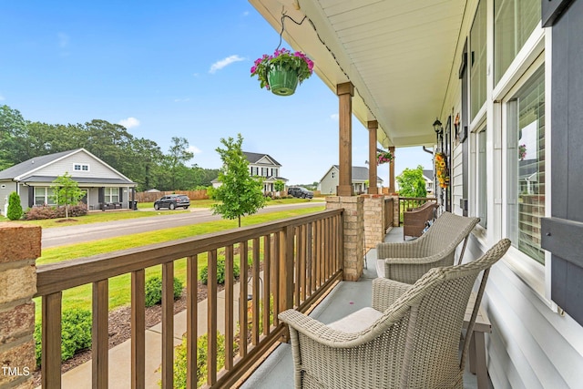 173 Longbow Dr, Middlesex, NC 27557 - covered porch with a residential view
