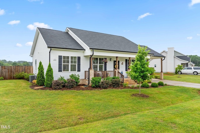 173 Longbow Dr, Middlesex, NC 27557 - view of front of home featuring covered porch, central AC, roof with shingles, and driveway