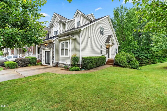 112 River Dell Townes Ave, Clayton, NC 27527 - view of front of home featuring a front lawn and stone siding