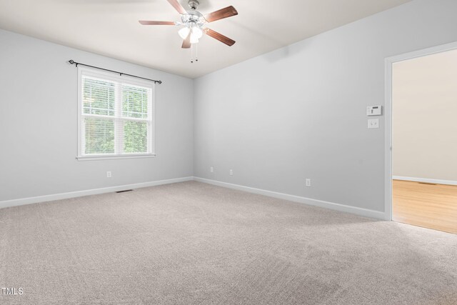 112 River Dell Townes Ave, Clayton, NC 27527 - carpeted spare room with a ceiling fan and baseboards