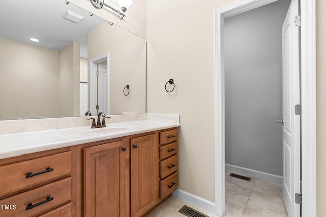 112 River Dell Townes Ave, Clayton, NC 27527 - bathroom featuring vanity, tile patterned flooring, and baseboards