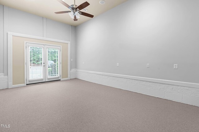 112 River Dell Townes Ave, Clayton, NC 27527 - carpeted empty room with ceiling fan, french doors, and lofted ceiling