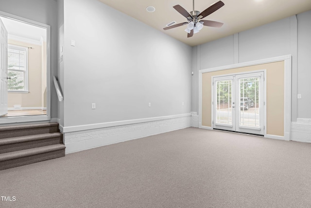 112 River Dell Townes Ave, Clayton, NC 27527 - carpeted spare room with healthy amount of natural light, ceiling fan, french doors, stairs, and lofted ceiling