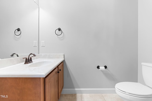 112 River Dell Townes Ave, Clayton, NC 27527 - half bathroom featuring toilet, vanity, tile patterned flooring, and baseboards