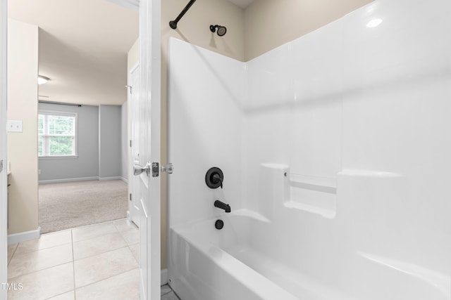 112 River Dell Townes Ave, Clayton, NC 27527 - bathroom with bathtub / shower combination, tile patterned floors, and baseboards