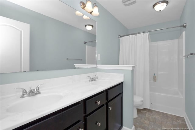 full bathroom with toilet, shower / bathtub combination with curtain, double vanity, and stone finish floors