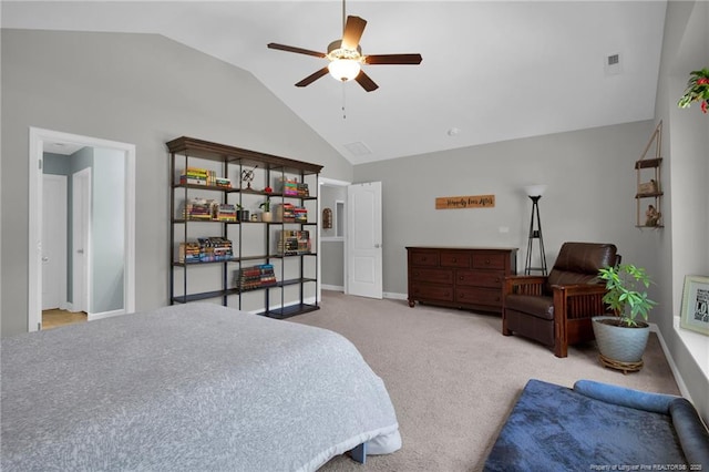 carpeted bedroom featuring vaulted ceiling, baseboards, and ceiling fan