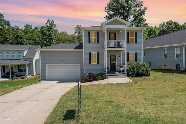 187 Ashley Woods Ct, Clayton, NC 27527 - greek revival house with a balcony, driveway, a front lawn, and a garage