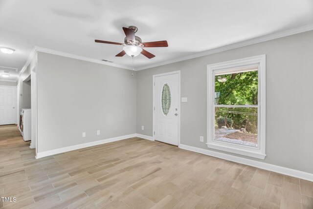 308 Lynn Rd, Durham, NC 27703 - entryway with a ceiling fan, ornamental molding, light wood finished floors, and baseboards
