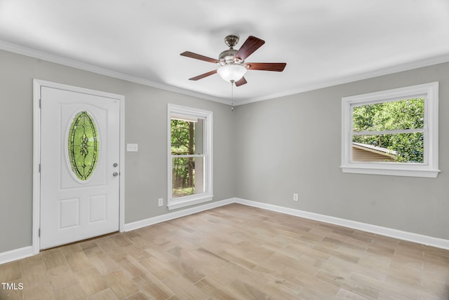 308 Lynn Rd, Durham, NC 27703 - entrance foyer with a ceiling fan, baseboards, light wood-style floors, and crown molding