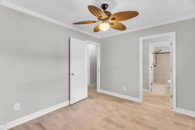 308 Lynn Rd, Durham, NC 27703 - unfurnished bedroom featuring crown molding, baseboards, light wood-style flooring, and ceiling fan