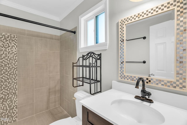 308 Lynn Rd, Durham, NC 27703 - full bathroom with toilet, vanity, tiled shower, and crown molding