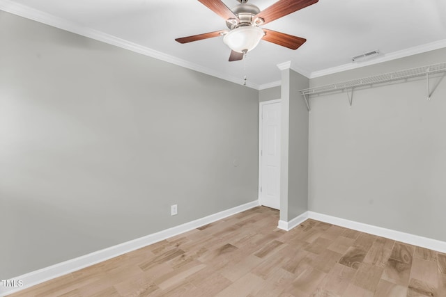 308 Lynn Rd, Durham, NC 27703 - unfurnished bedroom with light wood-style floors, baseboards, ornamental molding, and ceiling fan