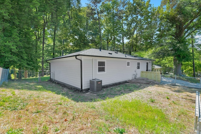 308 Lynn Rd, Durham, NC 27703 - back of property with a gate and central AC unit