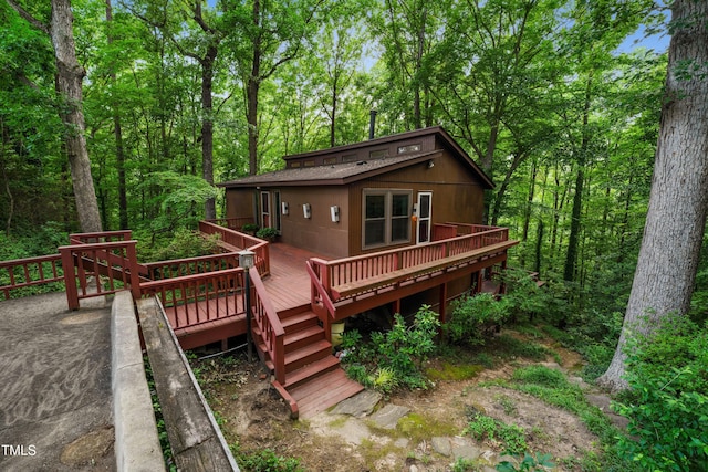 3416 Ocotea St, Raleigh, NC 27607 - rear view of house with a wooden deck