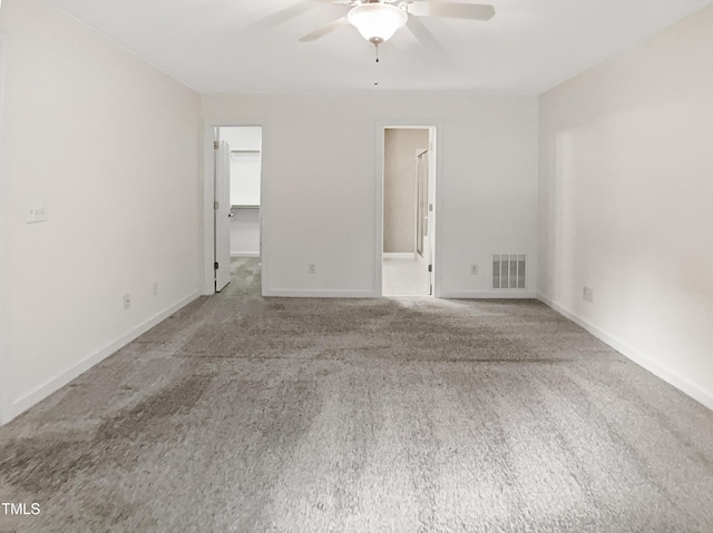 150 Remington Ct, Youngsville, NC 27596 - unfurnished bedroom featuring a spacious closet, baseboards, and carpet floors