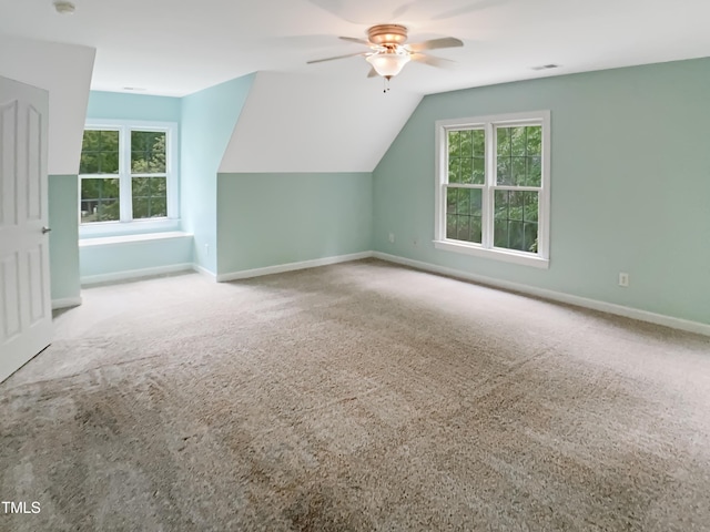 150 Remington Ct, Youngsville, NC 27596 - bonus room featuring a ceiling fan, carpet floors, baseboards, and lofted ceiling