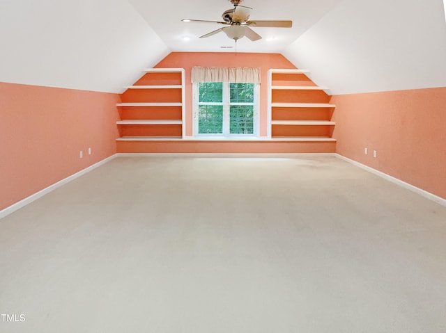 150 Remington Ct, Youngsville, NC 27596 - additional living space featuring vaulted ceiling, a ceiling fan, baseboards, carpet floors, and built in features