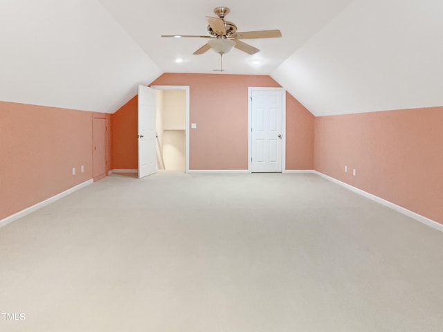 150 Remington Ct, Youngsville, NC 27596 - additional living space with a ceiling fan, baseboards, lofted ceiling, and light colored carpet