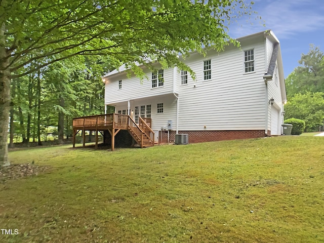 150 Remington Ct, Youngsville, NC 27596 - back of property with a wooden deck, central AC, stairs, and a yard