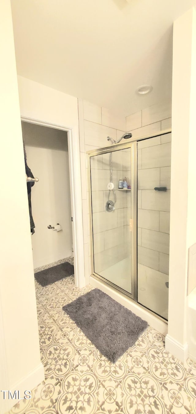 212 Placid Pond Dr, Broadway, NC 27505 - full bath with a shower stall and tile patterned flooring