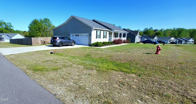 212 Placid Pond Dr, Broadway, NC 27505 - view of front of property with concrete driveway and a garage