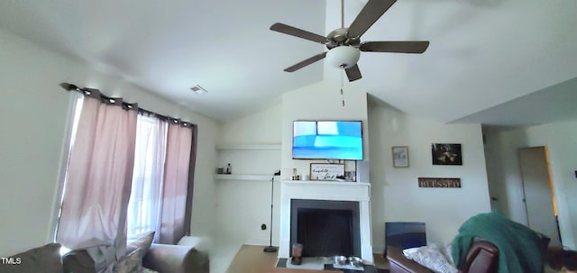 212 Placid Pond Dr, Broadway, NC 27505 - living room with a fireplace, a ceiling fan, and lofted ceiling
