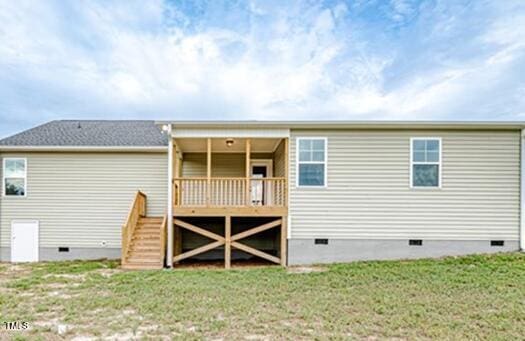 212 Placid Pond Dr, Broadway, NC 27505 - rear view of property with crawl space, stairway, a lawn, and a wooden deck
