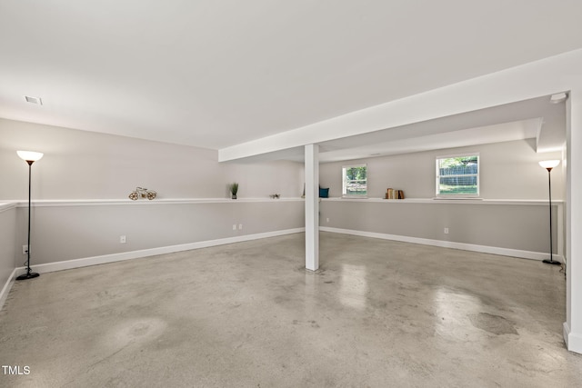 basement featuring baseboards
