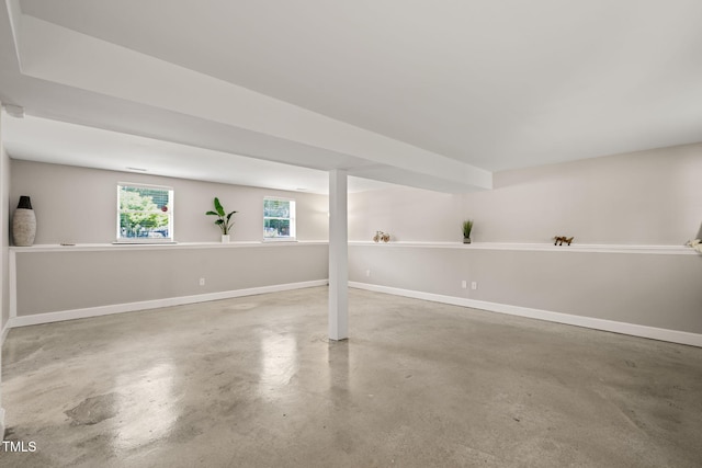 below grade area featuring baseboards