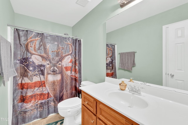 bathroom with toilet, tile patterned flooring, vanity, and a shower with curtain
