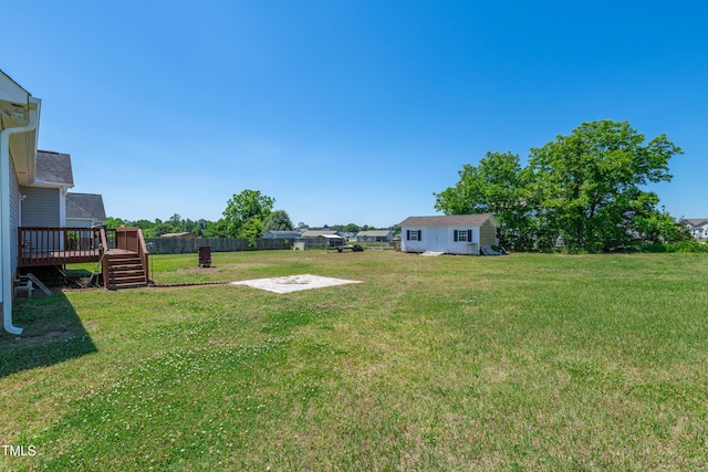 view of yard featuring a deck