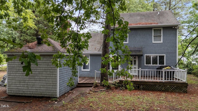 1100 Cardinals Knob, Rocky Mount, NC 27804 - back of property with a wooden deck, roof with shingles, and a chimney