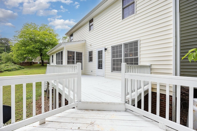 deck featuring a yard