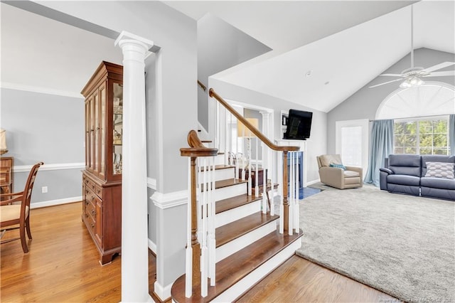 1110 Oakridge Blvd, Lumberton, NC 28358 - stairway with wood finished floors, ceiling fan, vaulted ceiling, ornate columns, and baseboards