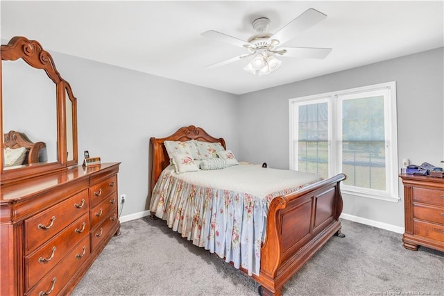 1110 Oakridge Blvd, Lumberton, NC 28358 - bedroom featuring light colored carpet, baseboards, and a ceiling fan
