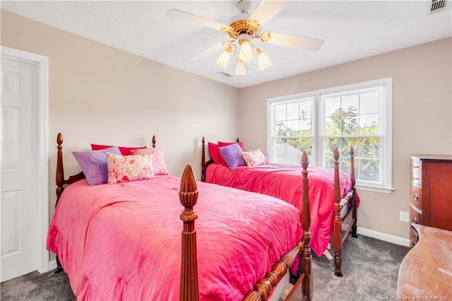 1110 Oakridge Blvd, Lumberton, NC 28358 - bedroom featuring carpet floors, baseboards, and a ceiling fan