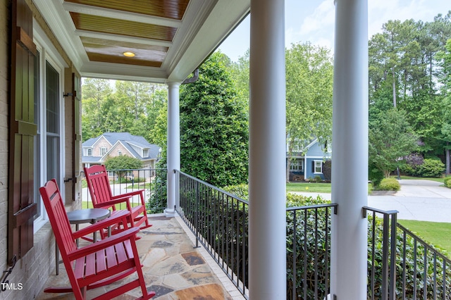 balcony featuring covered porch
