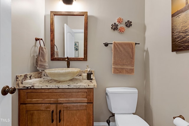 half bath with toilet and vanity