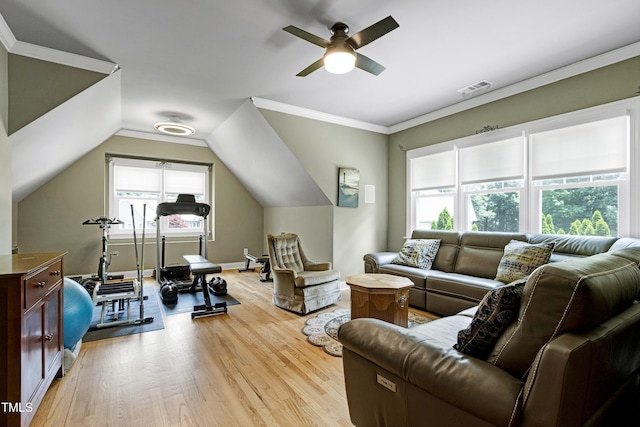 living room with light wood-style flooring, a ceiling fan, vaulted ceiling, and baseboards