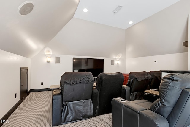 home theater room with light colored carpet, vaulted ceiling, baseboards, and recessed lighting