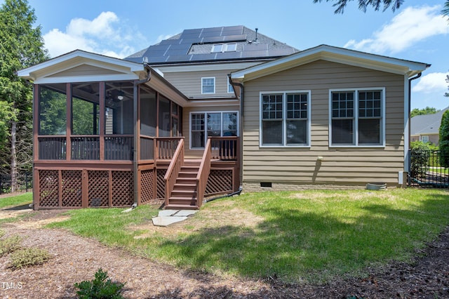 back of property with a sunroom, crawl space, stairs, a yard, and a wooden deck
