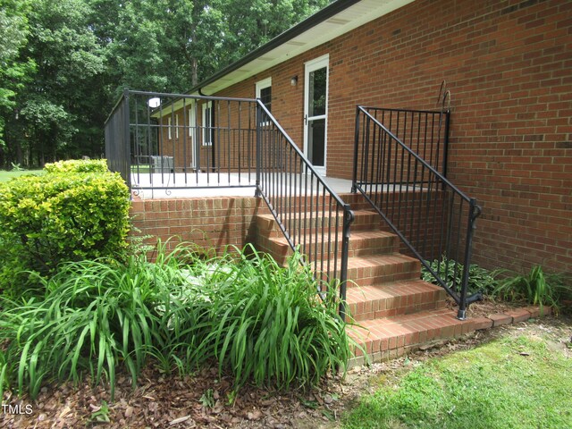 819 Patterson Grove Rd, Ramseur, NC 27316 - view of exterior entry with brick siding