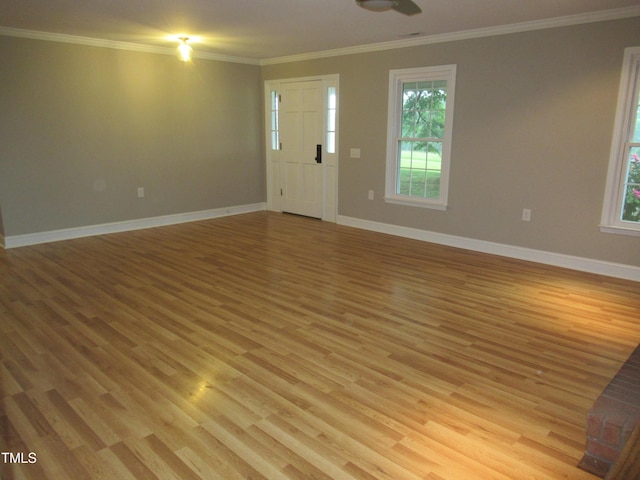 819 Patterson Grove Rd, Ramseur, NC 27316 - unfurnished room with plenty of natural light, light wood finished floors, crown molding, and baseboards