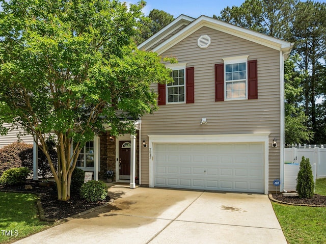 2012 Sterling Hill Dr, Fuquay Varina, NC 27526 - traditional-style home with a garage, driveway, and fence