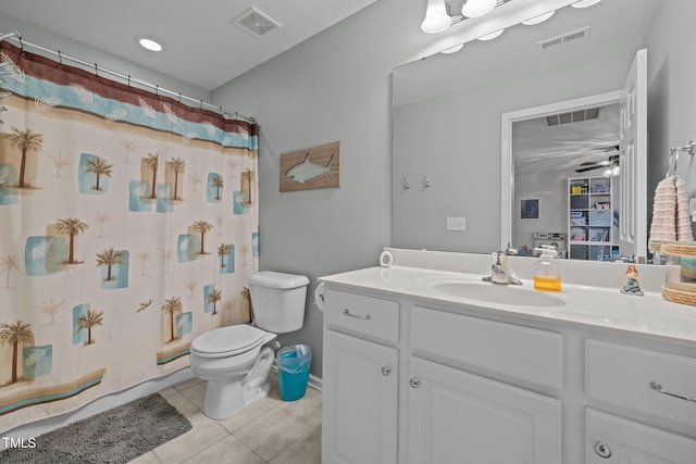 2012 Sterling Hill Dr, Fuquay Varina, NC 27526 - bathroom featuring tile patterned flooring, toilet, vanity, and a shower with shower curtain